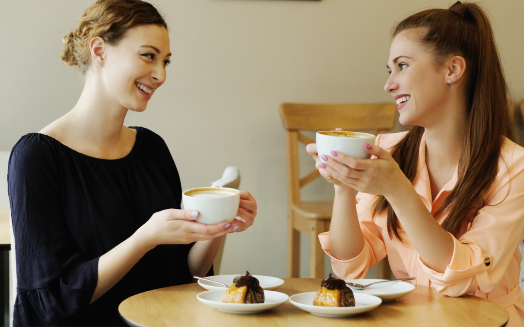 women- enjoying coffee in cafe